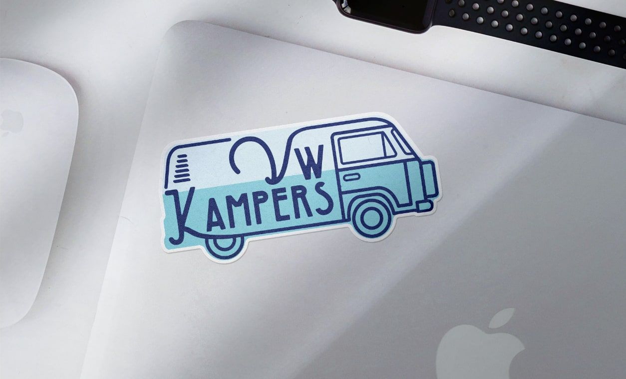 Camper van sticker design stuck to a laptop